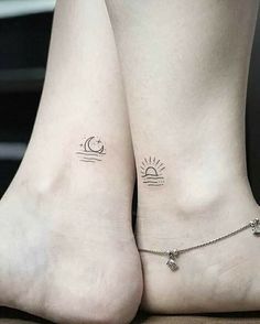 two people with small tattoos on their feet, one has a sun and the other has a moon