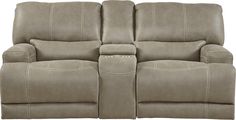 the reclining loveseat has two seats and a cup holders on each side