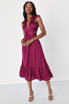 We are certain that you'll receive an endless amount of compliments no matter where you wear the Lulus Polished Elegance Plum Purple Ruffled Lace-Up Midi Dress! Satiny woven fabric shapes this stunning dress that features short ruffled sleeves, that support a pleated bodice (with hidden padding) with a plunging V-neckline and a flirty lace-up back. Twin cutouts accent the pleated, crossover waist, that sits atop a tiered A-line skirt that falls to a midi hem. Hidden back zipper/clasp. Fit: This Purple Semi Formal Dresses, Chic Purple Flowy Midi Dress, Flowy Purple Midi Dress, Purple Ruffled Midi Dress, Purple Wedding Guest Dresses, Plum Midi Dress, Chic Purple V-neck Midi Dress, Midi Wedding Guest Dress, Summer Wedding Guest Dresses