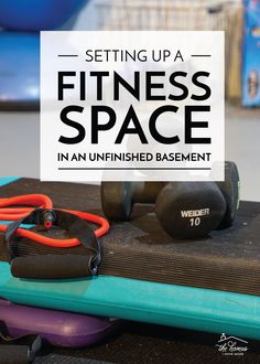 an exercise mat with dumbbells and weights in front of the text setting up a fitness space in an unfinished basement