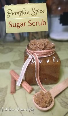 a jar of sugar scrub sitting on top of a table