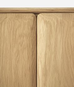 the side view of a wooden cabinet with two doors and one door open to show wood grain