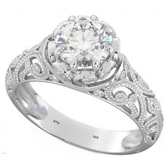 a diamond engagement ring with an intricate design