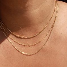 This flat gold filled bead chain is both trendy and simple. The delicate design makes it perfect to pair with any of your current staples, or for a unique look you can layer it with additional pieces. Its versatility and subtle shine makes it a great addition to any look. • Single Chain Necklace• Gold Filled• Length: 16" + 1" extender (to make adjustable to wear at different lengths)• Width: 2mm 14k Gold Filled Beaded Chain Necklace, Gold Minimalist Layered Necklace With Beaded Chain, Delicate Gold Chain Necklace With Tiny Beads, Gold Chain Necklace With Tiny Beads For Everyday, Gold Layered Necklace With Delicate Chain And Round Beads, Everyday Gold Chain Necklace With Tiny Beads, Everyday Jewelry Gold, Body Sweat, Chain Necklace Gold