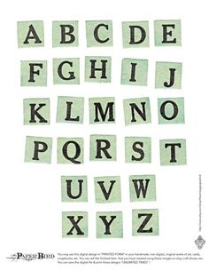 the letters and numbers are made out of torn green paper with black ink on them