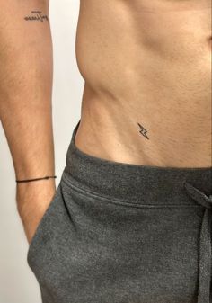 lightning tattoo |   couple tattoos viking rune Minimal Tattoos For Men, Meaningful Tattoos For Men, Thigh Tattoo Men, Rib Tattoos For Guys, Lightning Tattoo, Private Tattoos, Small Chest Tattoos, Bauch Tattoos, Simple Tattoos For Guys