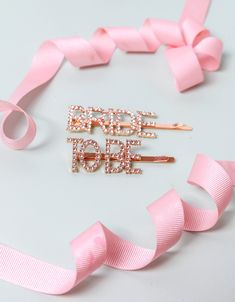 "Bride to Be Hair Slide is the perfect gift for Bride To Be . The gold colour and shiny Bride To Be  two pieces hair slide will be a great accessory on your hen party. And it can be used as one piece of Bride hair pin on your wedding day and honeymoon. A beautiful diamanté hair clip with the word \"Bride\" and \"To Be\"on Bride Bobby Pin, Bride Hair Slide, Sparkly Bride Hairpin Slide, Bride Proposal Gift Hair PinPink Positive Shop is dedicated to bringing joy people's happy memories and special celebrations with personalised gifts. Pink Positive finds motivation in creating a thoughtful gift that someone will find beautiful, with the power to create a special moment between two people." Bride Hairpin, Bride Proposal, Gift For Bride To Be, Bride Hair Pins, Bride Hair, Wedding Hair Pins, Bobby Pin, Hair Slide, Proposal Gifts