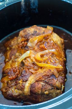 the meat is cooked and ready to be served in the slow cooker for dinner