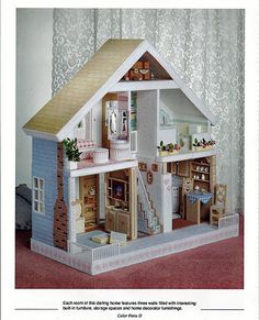 a doll house with furniture and accessories in it