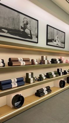 the shelves are filled with different types of yoga mats