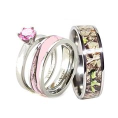 two wedding rings with pink and white camo inlays, one has a diamond