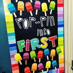 a sign that says poppin'into first with popsicles all over the front