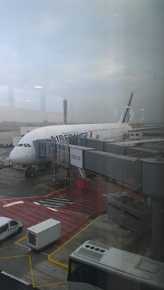 an airplane is parked at the airport terminal