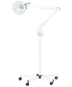 The Marilyn Magnifying Lamp on Casters is a 5 Diopter Magnifying Lamp that comes with both a stand and a rolling base. This lamp has a 37" extendable arm making it fully adjustable for any workspace. The base with wheels makes this lamp easy to move around the spa and very versatile. It has an on/off light switch, which also has a protective cover for added safety. When fully extended, this salon mag lamp is 6'3" at its highest point. This magnifying light is designed specifically for use in any Spray Tan Machine, Vibe Rooms, Kids Salon, Barber Equipment, Salon Mirrors, Shampoo Chair, Spa Equipment, Spa Accessories, Skin Care Spa