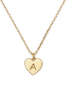 Personalize your everyday ensemble with a dainty chain necklace that suspends a heart-shaped pendant engraved with your initial. 17" length; 3" extender; 3/8"W x 3/8"L pendant Lobster clasp closure Goldtone plate Imported I Necklace, Letter Necklace Initials, K Necklace, Dainty Chain Necklace, Gold Initial Necklace, Initial Necklaces, Initial Necklace Gold, Jewelry Luxury, Dainty Chain