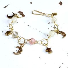 Cherry Quartz Crystal Beaded Bracelet Gold Tarnish Resistant Wire Wrapped Gemstone Beads & Gold Plated Charms Crescent Moons & Stars Hook Style Clasp Bracelet Measures 7.5" In Length 1 Piece Handmade Offers Welcome Cherry Quartz, Clasp Bracelet, Crystal Beads Bracelet, Bracelet Charm, Bracelet Clasps, Women Artisans, Bracelet Gold, Crystal Bracelets, Stars And Moon