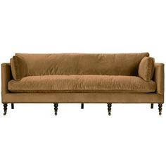 a brown couch sitting on top of a wooden frame