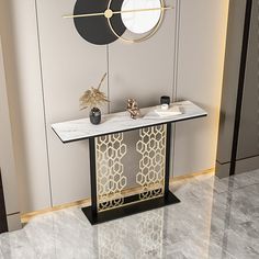 a console table with two vases on it in front of a wall mounted clock