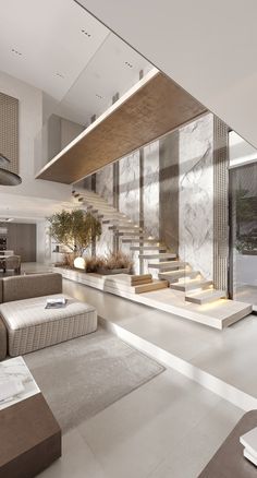 a modern living room with stairs leading up to the second floor