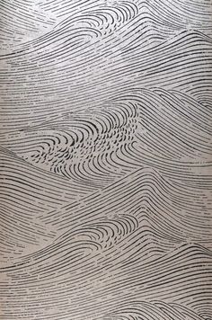 an abstract drawing with wavy lines in grey and white