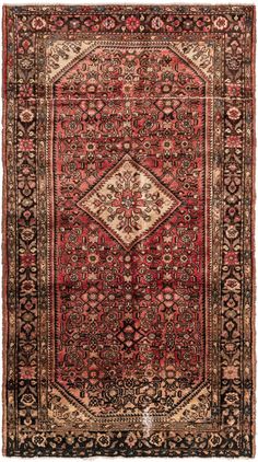 an antique persian rug with red and black colors