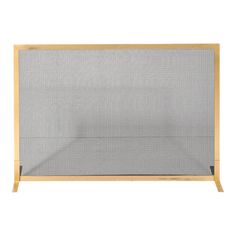 a metal and wood fireplace screen on a white background