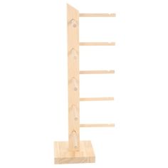 a wooden rack with three pegs on it