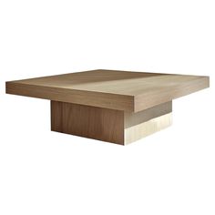 a square wooden table with two different colored edges