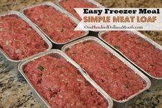 four trays of meat sitting on top of a counter next to a granite counter