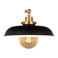 a black and gold light fixture with an open bulb on the top, against a white background