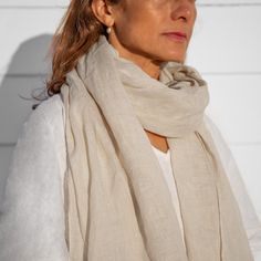 Wrap yourself in the soft embrace of our versatile linen scarves, designed to provide a cloud of comfort wherever you go. Crafted from 100% premium European linen, these scarves are perfect for adding both warmth and style to your look. With their light, breathable texture, they’re ideal for layering in cooler months or serving as a chic, airy accessory in warmer weather. Available in a carefully curated selection of rich and subtle tones, each scarf is generously sized and finished with delicate fringed edges, adding a touch of understated elegance. Whether you're navigating winter's chill or enjoying a sunlit day, these linen scarves are the perfect year-round companion—effortlessly stylish and beautifully functional. Product Information Material: Woven from 100% European Flax Linen Pinafore Apron, Rough Linen, Linen Pinafore, Linen Robe, Pinafore Apron, Linen Bath Towels, Linen Scarf, Linen Pajamas, Bath Gift Set