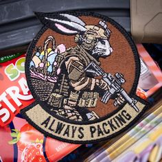 Introducing our April 2024 POTM standout: the 'Tactical Battle Bunny' patch, an unapologetically fierce emblem boasting the intimidating declaration that he's, 'ALWAYS PACKING'. Don't let this chance escape you to snag this badass 4-inch Bad Bunny patch, crafted in the unmistakably bold style of OCP. Approximately 4 inches tall by 4 inches wide Hook Fastener backing Made in the USA, by Tactical Gear Junkie. *Does Not Include Matching Loop Fastener Piece* Patches Ideas, Funny Flags, Tactical T Shirts, Tactical Hat, Shirt Sketch, Funny Patches, Army Humor, Morale Patches, Gym Guys