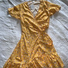 Never Worn Yellow Flower Wrap Dress. Fits Like A True Medium 8-10. Beautiful But Not For My Complexion. Yellow V-neck Dress With Ditsy Floral Print, Yellow Short Sleeve Dress With Ditsy Floral Print, Green Floral Print Dress, Floral Spaghetti Strap Dress, Mesh Cocktail Dress, Patch Dress, Green Tweed, Floral Wrap Dress, Woven Sweater