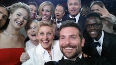 a group of people are smiling and posing for a photo with the caption oscars