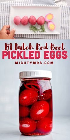 a jar filled with pickled eggs on top of a white table cloth next to a plate