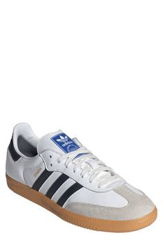 An ultralow profile refines this iconic sneaker detailed with serrated 3-Stripes and a gum-rubber sole embracing the retro aesthetic of a street-savvy icon. Lace-up style Removable insole Leather upper/textile lining/rubber sole Imported Retro Adidas, Unisex Shoes Sneakers, Gender Inclusive, Size 10 Women, Unisex Shoes, Women Men Shoes, Men Fits, Fabric Gift Bags, Retro Aesthetic