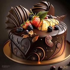 a chocolate cake with fruit on top is shown in this artistic photo, it appears to be made from fondant