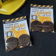 two bags of oreo cookies sitting on top of a table next to each other