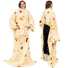 two women dressed in burritos standing next to each other, one wearing a robe