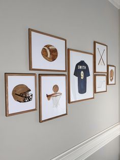 framed sports pictures hang on the wall