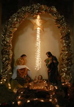 a nativity scene with three people and a star