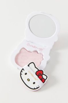 Stay shine-free and oil-free on-the-go with these mattifying blotting papers from The Crème Shop's Hello Kitty collection! Includes a reusable compact mirror case, adhesive puff and 100 sheets infused with clarifying green tea. Made cruelty-free.Content + Care. 100 count ImportedSize. Net weight: 0.125 oz Hello Kitty Foundation, Hello Kitty Eyelash Curler, Hello Kitty Skincare Products, Hello Kitty Makeup Products, Pretty Makeup Products, Cute Makeup Products, Hello Kitty Shopping, Hello Kitty Things, Hello Kitty Beauty