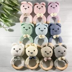 several crocheted teddy bears sitting next to each other