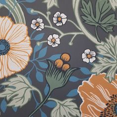 an orange and blue flowered wallpaper with white, black, and yellow flowers