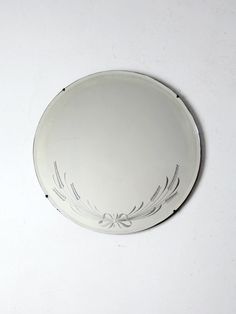 a white plate sitting on top of a table