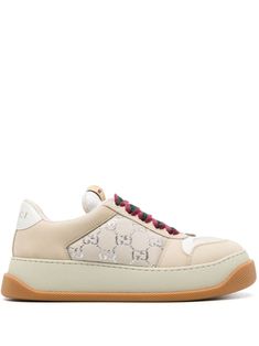 light beige multicolour calf leather panelled design GG lamé canvas signature Double G logo enamel detail logo plaque logo patch at the tongue branded heel counter wide laces round toe front lace-up fastening padded tongue padded ankle French terry lining branded insole chunky rubber sole This piece comes complete with a protective dust bag. Women's Gucci sneakers fit large. For the most comfortable fit please select half a size down. We've partnered with Good On You — an independent agency that Tenis Gucci, Gucci Screener, Double G Logo, Gucci Shoes Sneakers, Retro Sportswear, Guccio Gucci, Gucci Sneakers, G Logo, Green Sneakers