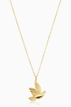 Feel the wind in your hair with our Freedom Dove Pendant Necklace. This special dove charm represents love, peace and freedom, making it the perfect meaningful gift for yourself or someone else. Wear it solo or layer it up; the solid gold will shine through either way! 14k Solid Yellow Gold 18 Inches Length, Adjustable to 17 Inches 1.7 Grams Solid Gold Crafted in Arezzo, Italy Aphrodite Alter, Arezzo Italy, Dove Pendant, Dove Necklace, Bird Necklace, Love Peace, Aphrodite, Solid Yellow, The Wind