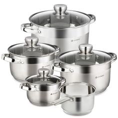 four stainless steel pots and pans with lids