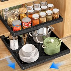 an open drawer in a kitchen filled with dishes