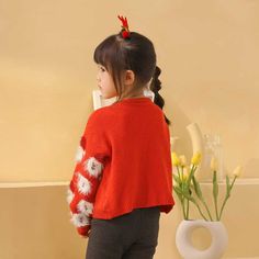 Playful Winter Soft Knit Sweater, Playful Winter Cardigan, Playful Red Christmas Tops, Cute Red Winter Sweater, Cute Red Winter Tops, Red Long Sleeve Christmas Sweater, Playful Long Sleeve Red Sweater, Cozy Red Holiday Tops, Playful Long Sleeve Christmas Sweater